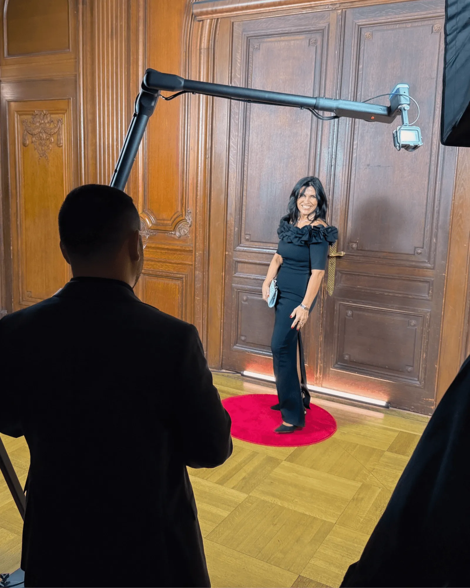 GlamBot robotic camera arm capturing a guest in slow motion at a Houston event